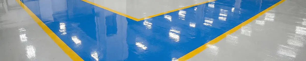 A factory floor professionally covered and marked with epoxy flooring in Henderson, NV
