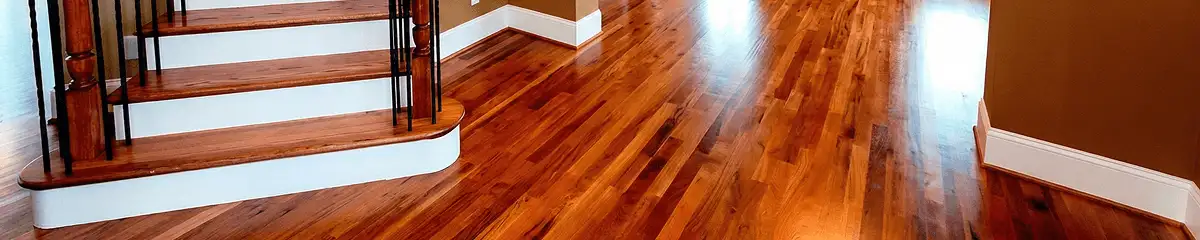 Base floor of a staircase with professionally restored wood flooring in Henderson NV